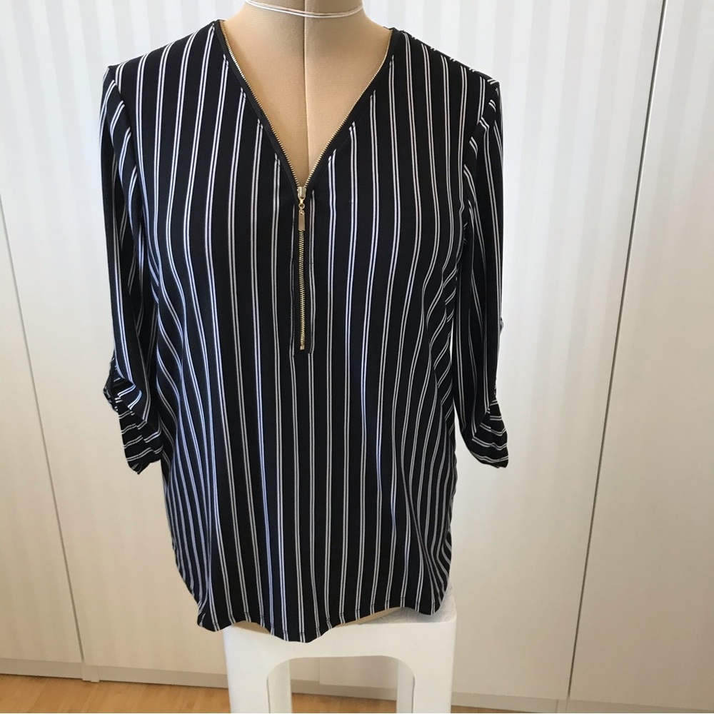 INC black with white stripe gold zipper neckline no wrinkle top Size L